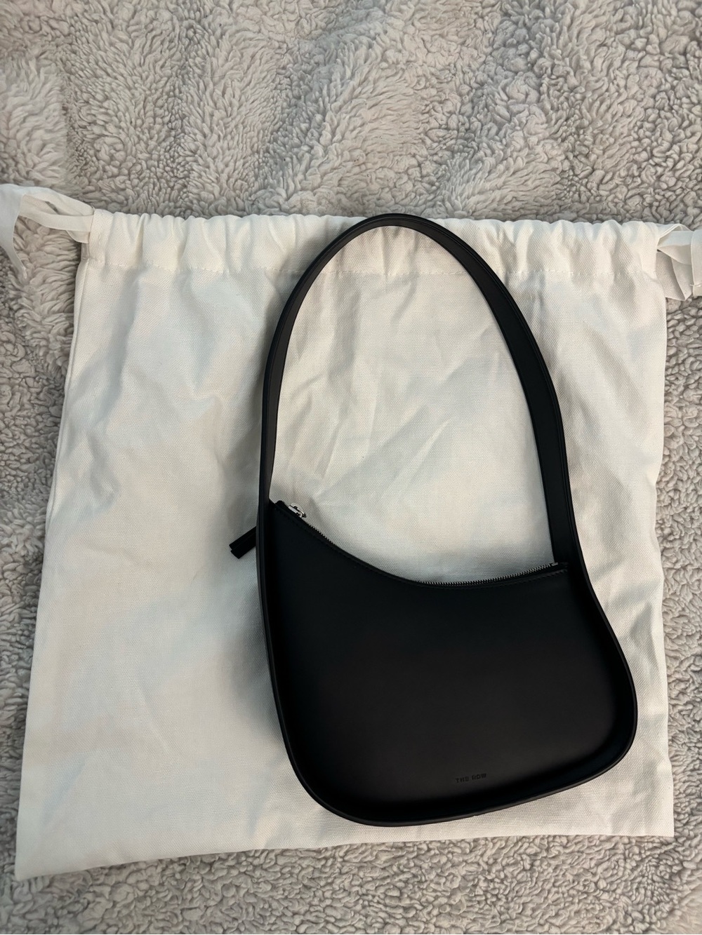 The Row Black half moon Shoulder Bag